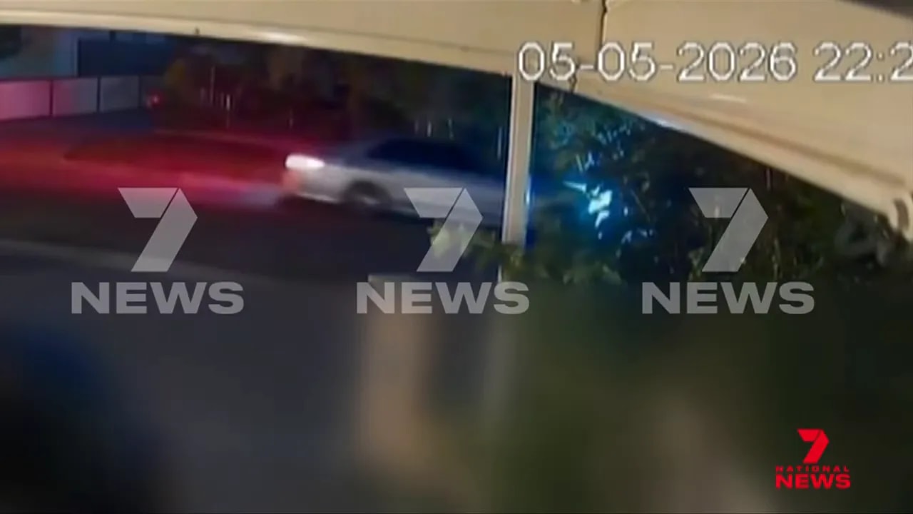 Security camera screenshot with timestamp showing vehicles near a property during the Bass Hill kidnapping investigation