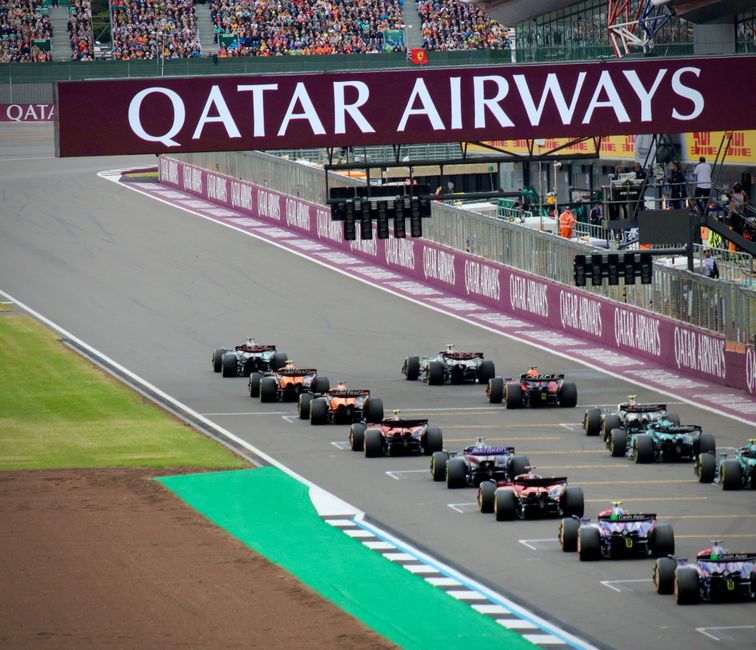 Oscar Piastri Clips George Russell in Chaotic Spanish Grand Prix Start