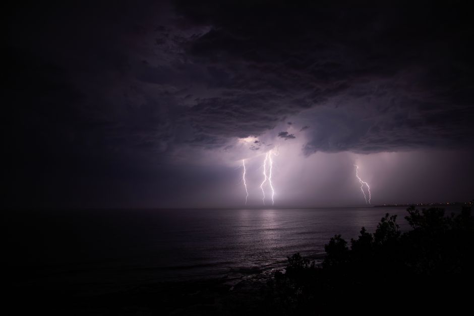 A powerful lightning storm illuminates the night sky over Culburra Beach, New South Wales.